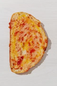 High angle view of a slice of pa amb tomaquet Stock Photos