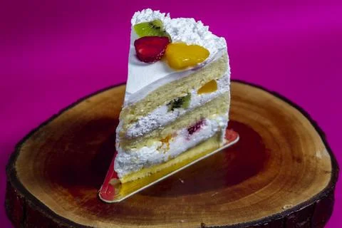 High angle view of sliced fruit cake on a wooden tray Stock Photos