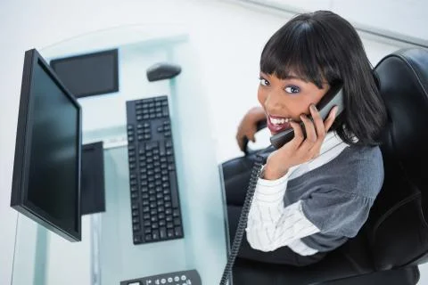 High angle view of smiling pretty businesswoman on the phone Stock Photos