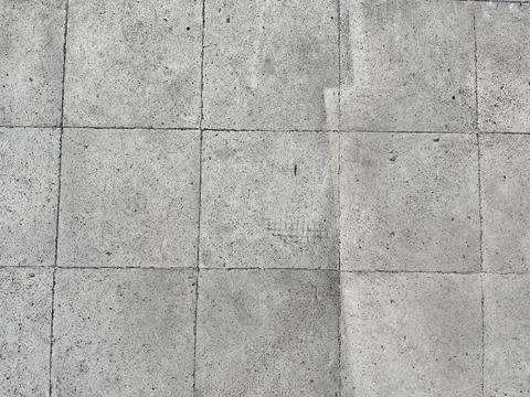 High angle view of square concrete paving slabs texture background Stock Photos