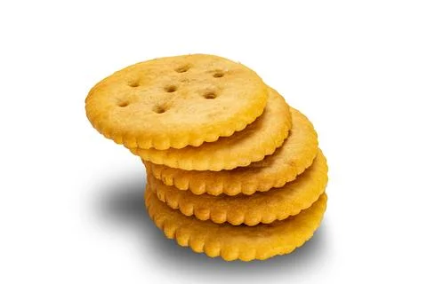 High angle view stack of salted round crackers isolated on white background. Stock Photos
