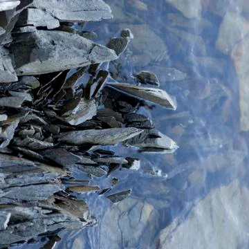 High angle view of stacked rocks in the lake, Kenora, Lake of The Woods, Stock Photos