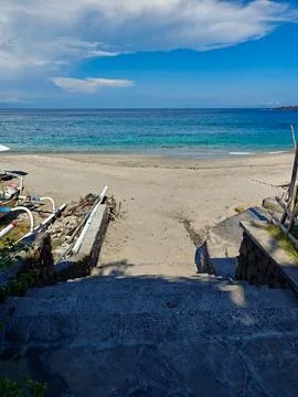 High Angle View of Stone Stairs Leading to a Tropical Sandy Beach Stock Photos