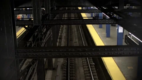 High Angle view of Subway arriving at Station in NYC Stock Footage 199986894