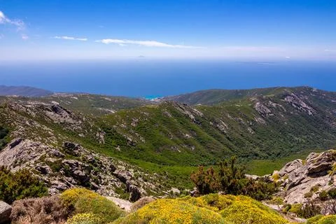 High angle view from summit station of Monte Capanne cable car to bay of Stock Photos