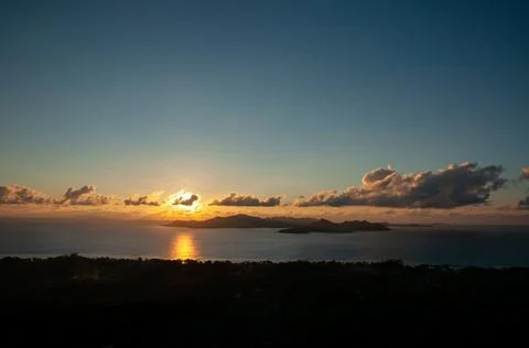 High angle view of the sunset over a island Stock Photos