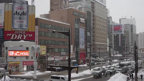 High angle view of Susukino intersection in Sapporo on a snowy day Stock-Footage 330176681