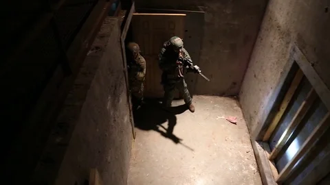 High Angle View of SWAT Trainees Entering Doorway Stock Footage 70562403