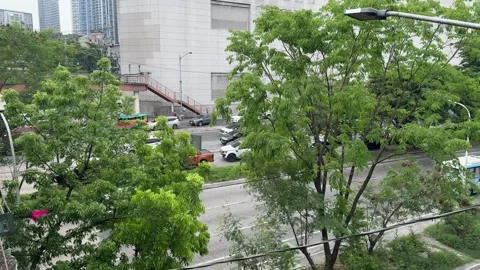 High angle view of Taguig city street framed by green trees 4K Vídeos de archivo 337950857