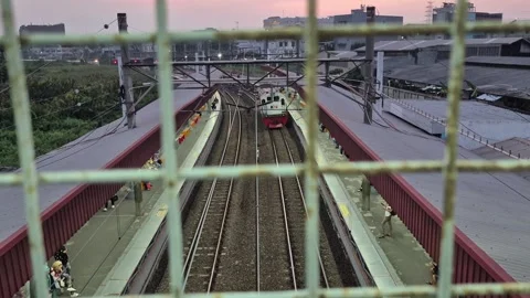 High angle view through fence grid of diesel locomotive Video stock 341757647