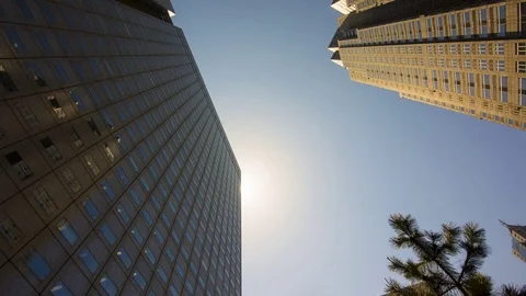High angle view time lapse sun moving with Skyscraper in bussiness Center. Stock Footage 75235642