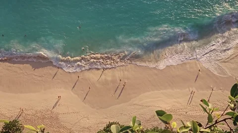 High Angle View of Tourists on Kelingking Beach at Sunset Stock Footage 340317778
