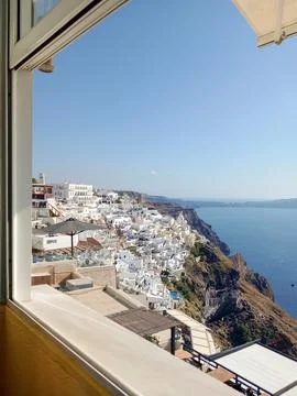 High angle view of townscape in rocks by sea, from window Stock Photos