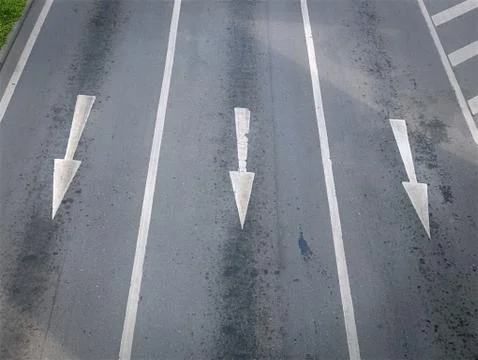 High Angle View of Traffic Arrows on Three Lanes Stock-Fotos