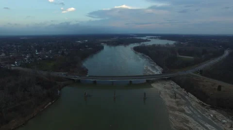 High angle view of traffic moving over bridge as camera moves away Stock Footage 60035778