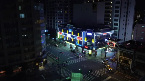 High angle view of traffic at a Tokyo intersection at night Stock Footage 54113294