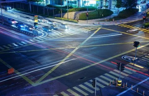 A high angle view of  treet intersection, with yellow cross walk markings, tr Stock Photos