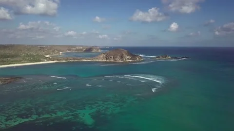 High Angle View of Tropical Island Coastline with Turquoise Ocean Waters Stock Footage 345041777