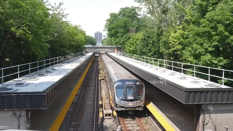 High angle view of TTC Toronto subway train arriving at station. Stock Footage 93593596