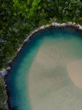High-Angle View of Turquoise Coastal Lagoon and Tropical Beach Stock Photos
