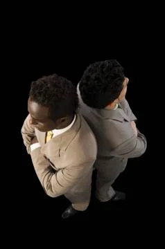 High angle view of two businessmen standing with arms crossed Fotos Stock