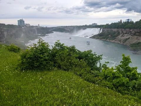 A High Angle View of Two Tourist Boats Beside Niagara Falls Stock Photos