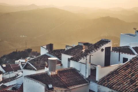 High-angle view of typical tiled rooftops and white walls of Spanish town h.. Foto stock