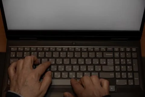 High angle view of typing on laptop. Stock Photos