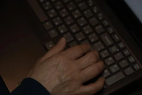 High angle view of typing on laptop. Stock Photos
