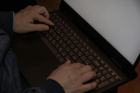 High angle view of typing on laptop. Stock Photos