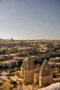 High angle view of unique volcanic tuff rock formations and fairy chimneys in Фото