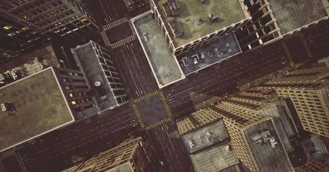 High angle view of urban city streets surrounded by tall buildings Ilustración de archivo