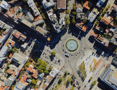 High-Angle View of Urban Streets with Parked Cars and Autumn Trees Stock Photos