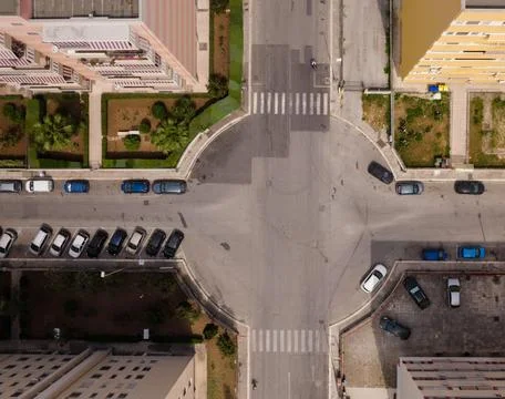 High-Angle View of Urban Streets with Parked Cars and Autumn Trees Stock Photos