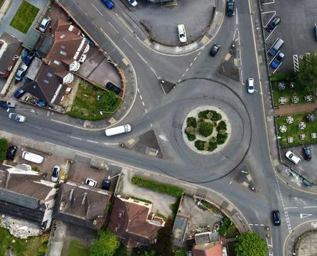 High-Angle View of Urban Streets with Parked Cars and Autumn Trees Stock Photos