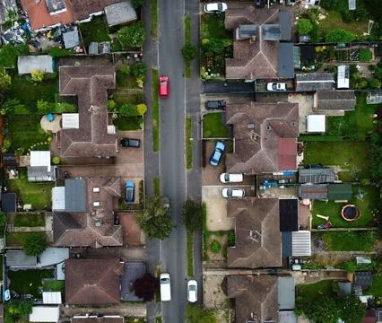 High-Angle View of Urban Streets with Parked Cars and Autumn Trees Stock Photos