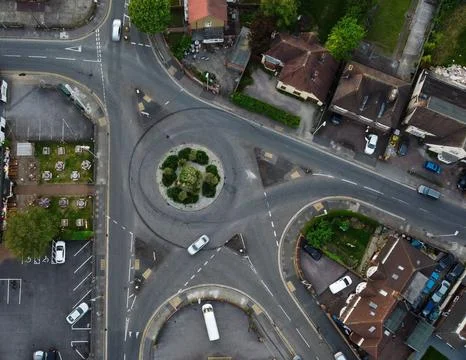High-Angle View of Urban Streets with Parked Cars and Autumn Trees Stock Photos