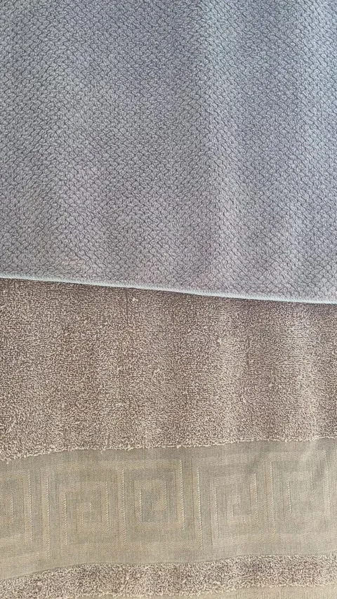 High Angle View of Various Carpet Fabric Texture Samples in Neutral Earth Tones Stock Footage 340898294