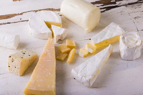 High angle view of various cheese on table, copy space Stock Photos