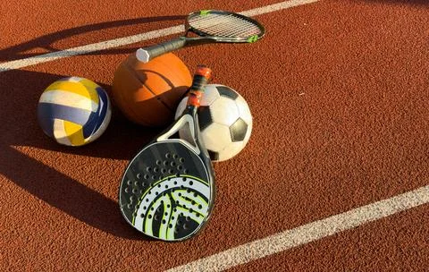High Angle View Of Various Sport Equipments On playground Photos