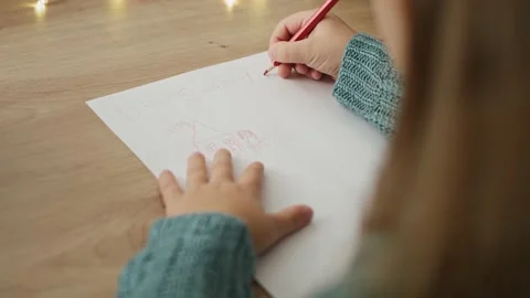 High angle view video of little boy writing a letter to Santa Claus 库存影片 141442784