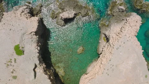 High angle view of the volcanic rocks along Milos coast, Greece Stock Footage 220182357