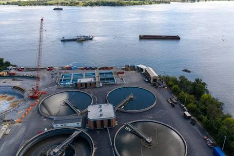 High angle view of water treatment facility with industrial tanks Stock Photos