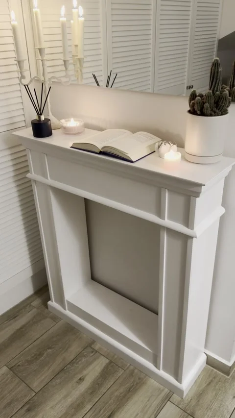 High Angle View of White Fireplace Mantel Hygge Setup 4K 60fps Video stock 344822365
