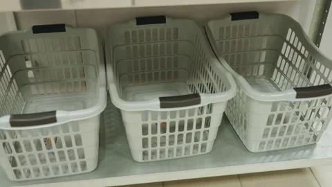 High Angle View White Laundry Baskets On Shelf Stock Footage 318844039