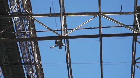 High Angle View of Worker Suspended on Industrial Steel Framework 動画素材 339123402