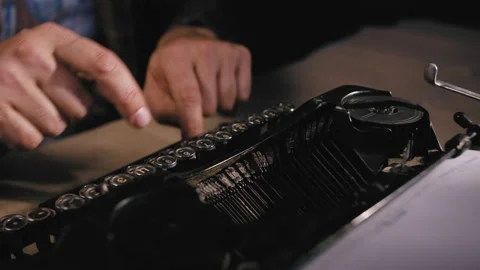 High angle view of writer prints on vintage typewriter Stock Footage 134598316