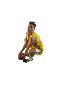 High angle view of young man, basketball player with a ball training isolated on Stock Photos