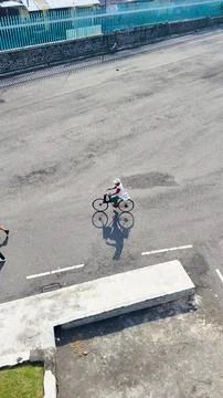 High angle view of young man wearing business suit while riding bicycle Stock Photos