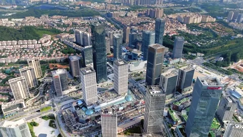 High angle Wanbo rooftops streets and city blocks in Guangzhou China Stock Footage 345956085